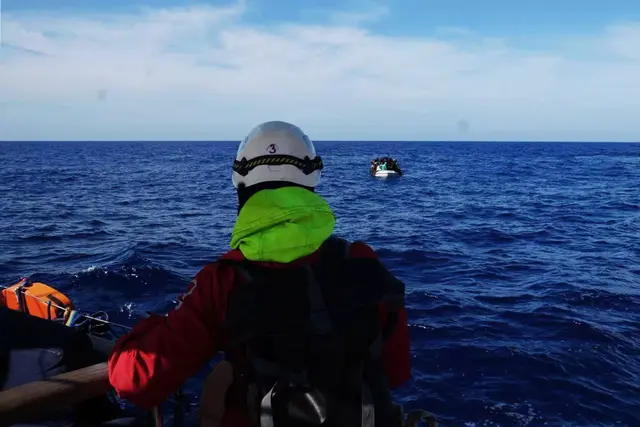 <p>The crowded boat is intercepted at sea</p>