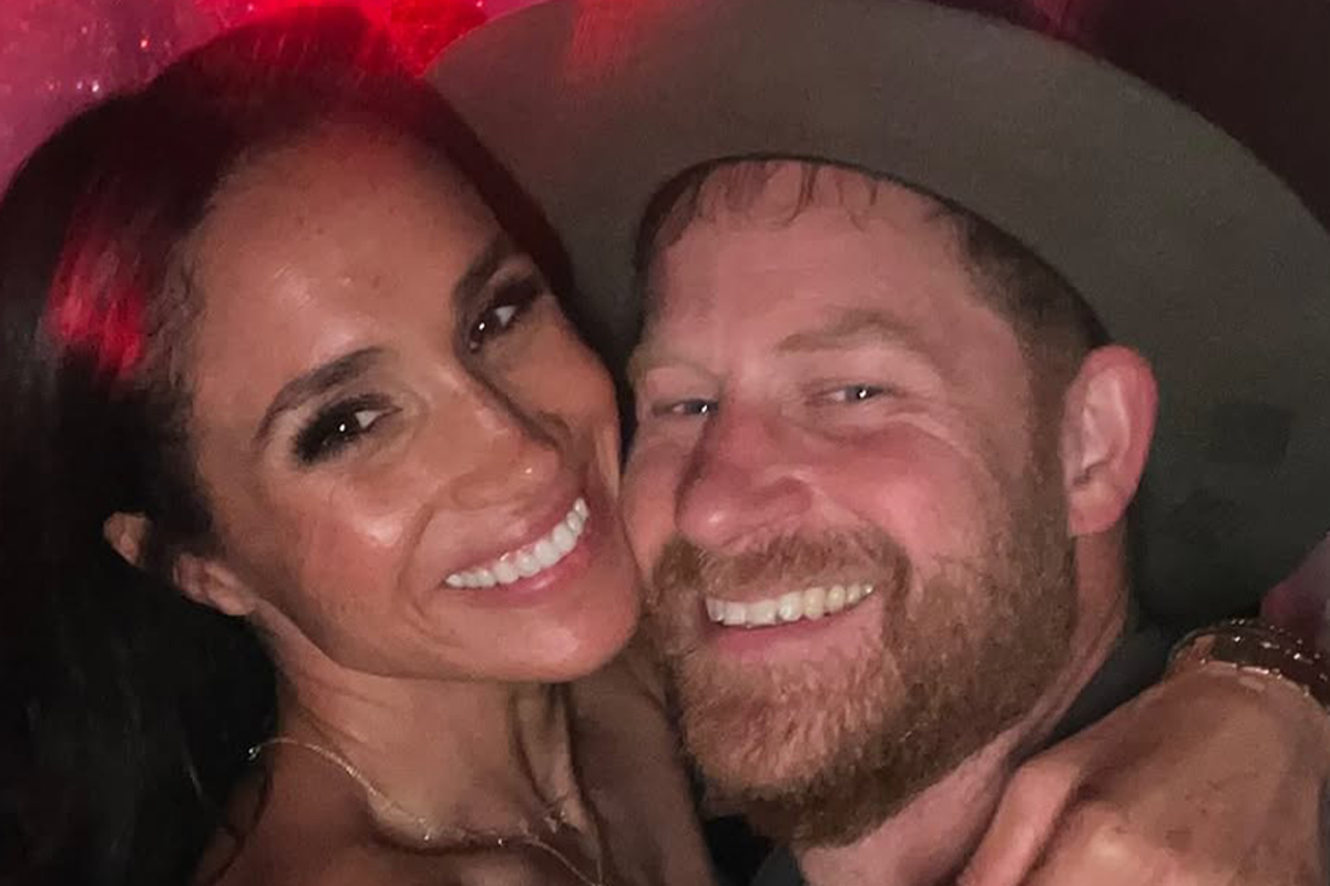 Meghan Markle and Prince Harry embrace during date night at Beyonce concert
