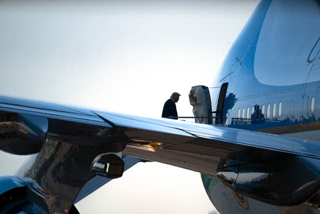 <p>President Donald Trump boards Air Force One at Selfridge Air National Guard Base in Warren, Michigan</p>