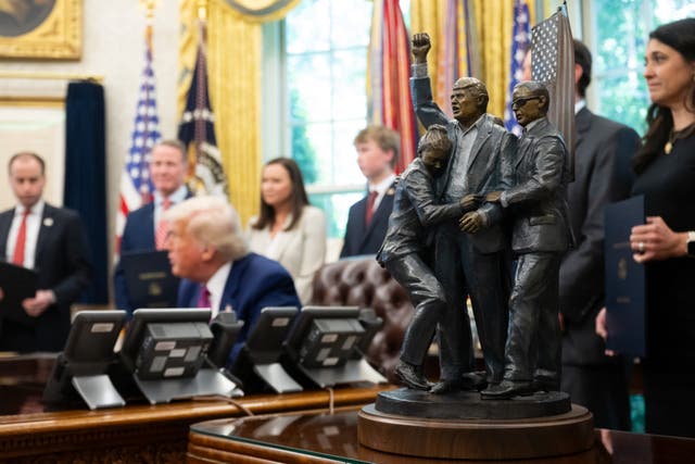 <p>A statue depicting the moments immediately after the assassination attempt on President Donald Trump is on proud display in the Oval Office. </p>