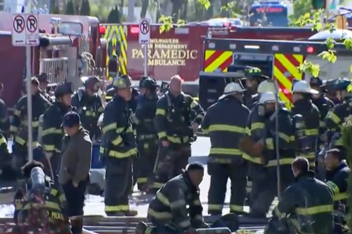 Four killed in Milwaukee apartment fire as residents jump from windows to flee from flames 