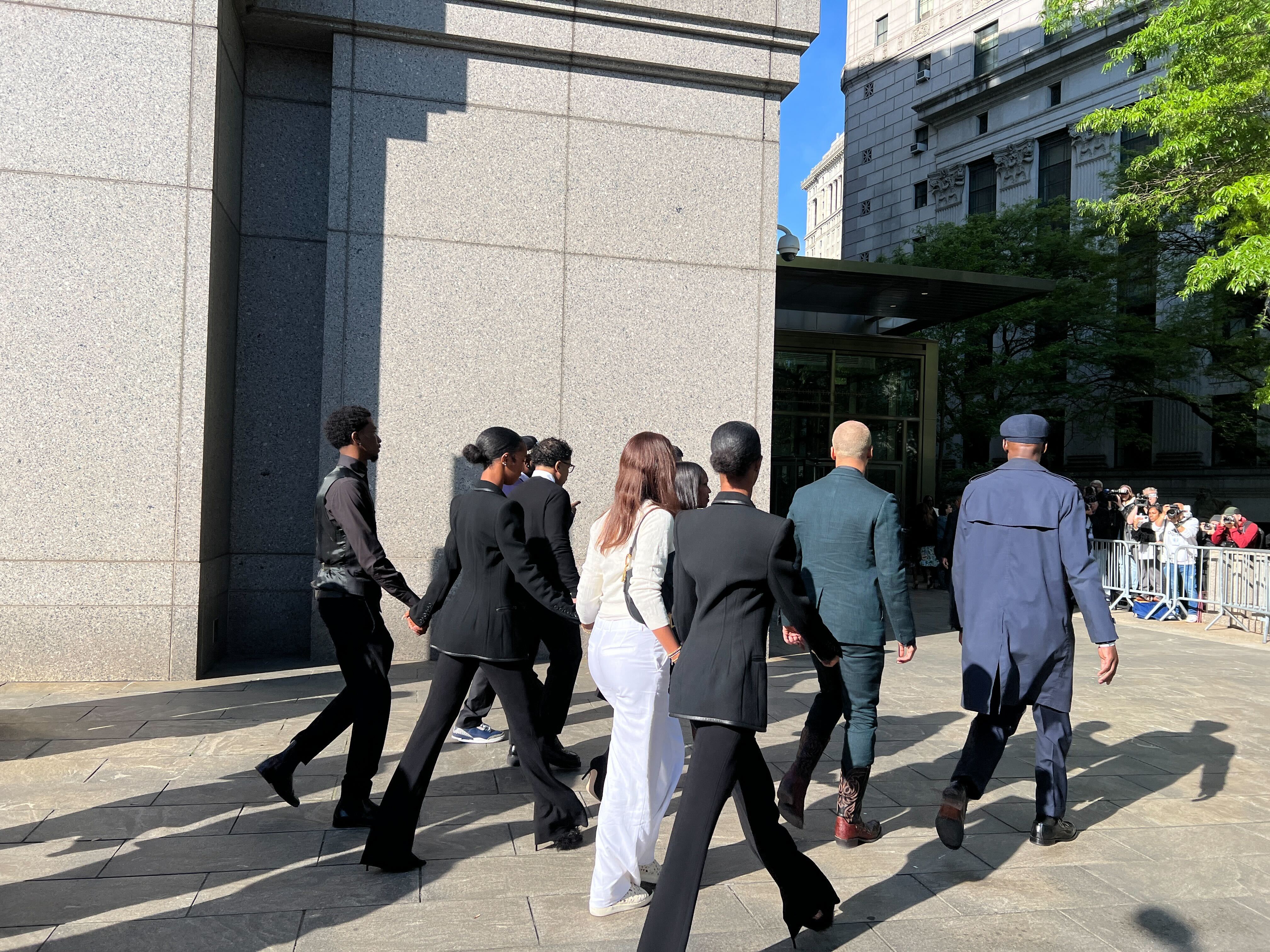 Diddy's children enter the courthouse as opening statements are set to begin in their father's sex trafficking trial.