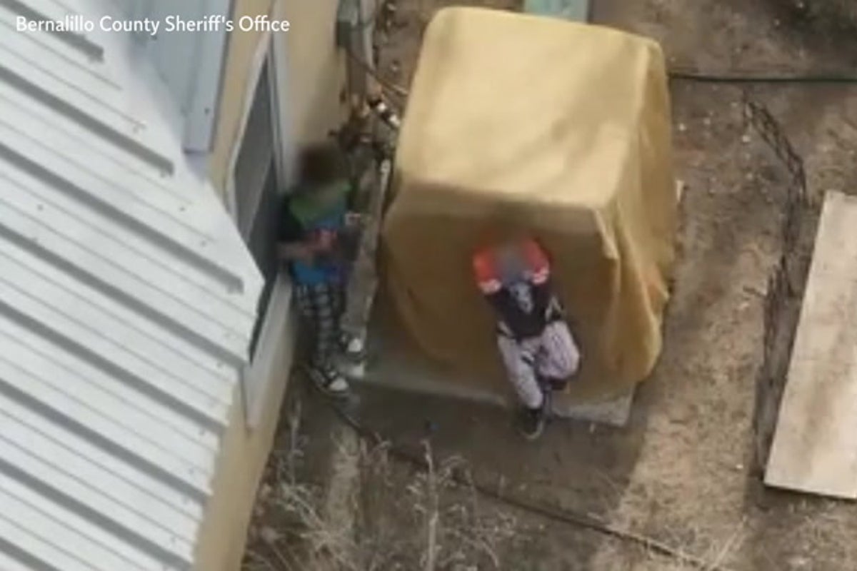 Young boys wearing Minecraft and Star Wars pyjamas in armed standoff with police
