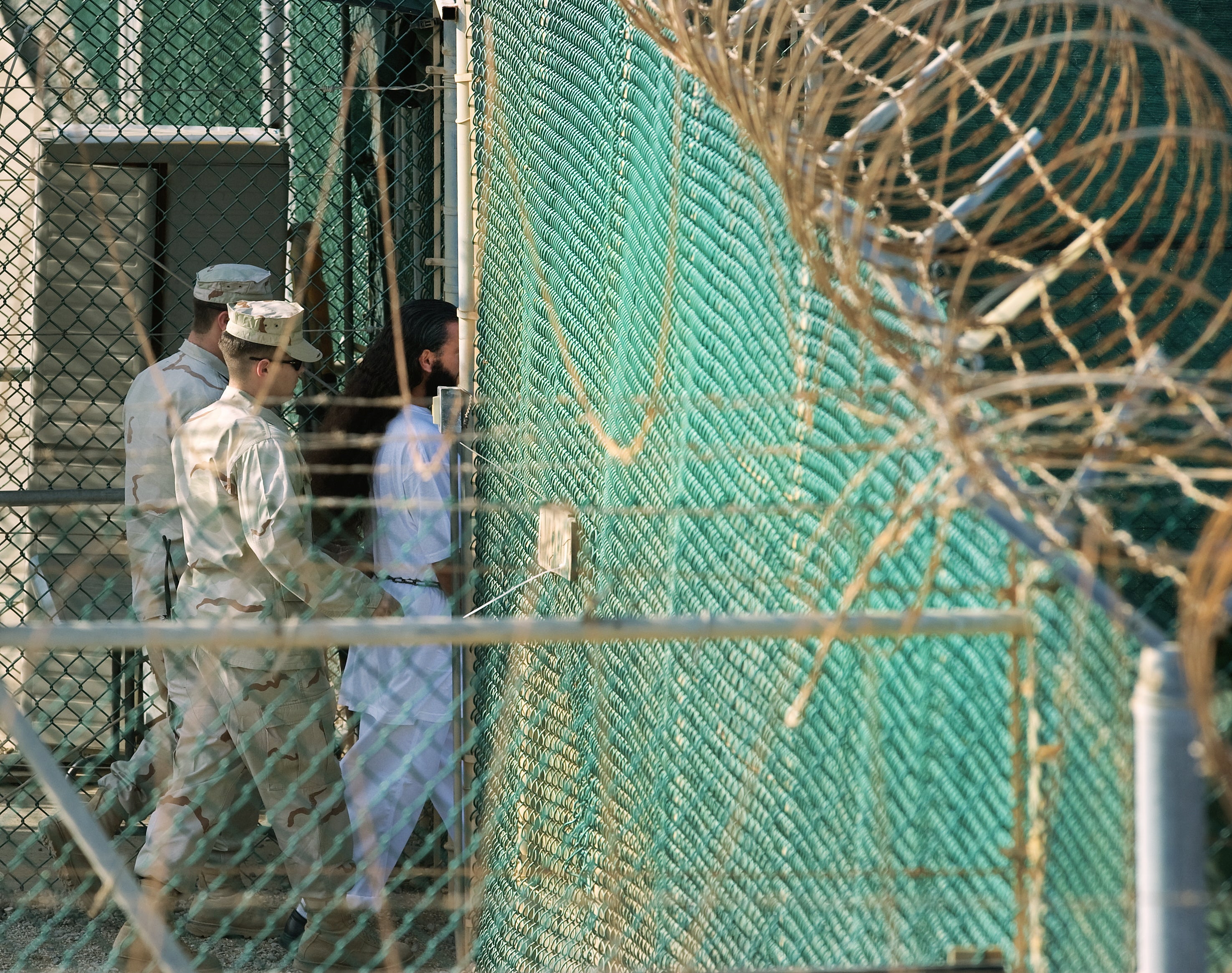 The Guantanamo Bay detention camp, established in 2002 at the US Naval Station in Cuba, was created to detain terrorism suspects and "illegal enemy combatants" as part of the post-9/11 "war on terror."
