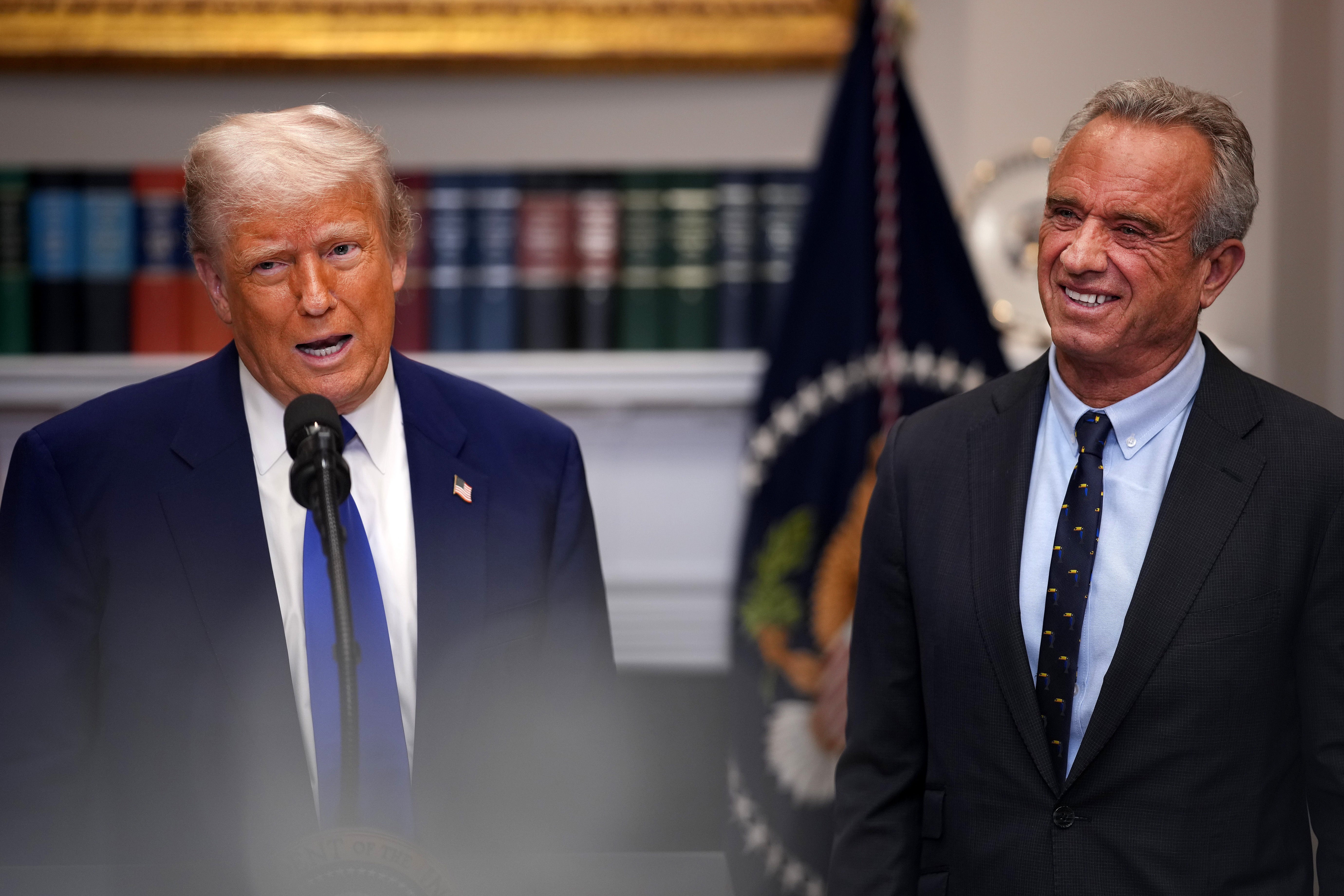 President Donald Trump with Health and Human Services Secretary Robert F. Kennedy Jr. as he launches his ‘most favored nation’ initiative on prescription drug prices