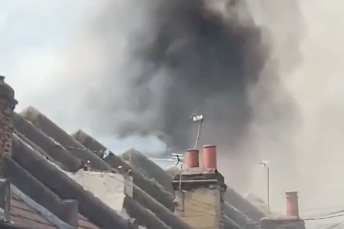 Huge fire rips through homes next to London Tube station