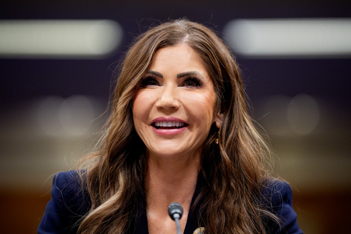 Kristi Noem faces angry protests as she collects doctorate at South Dakota university