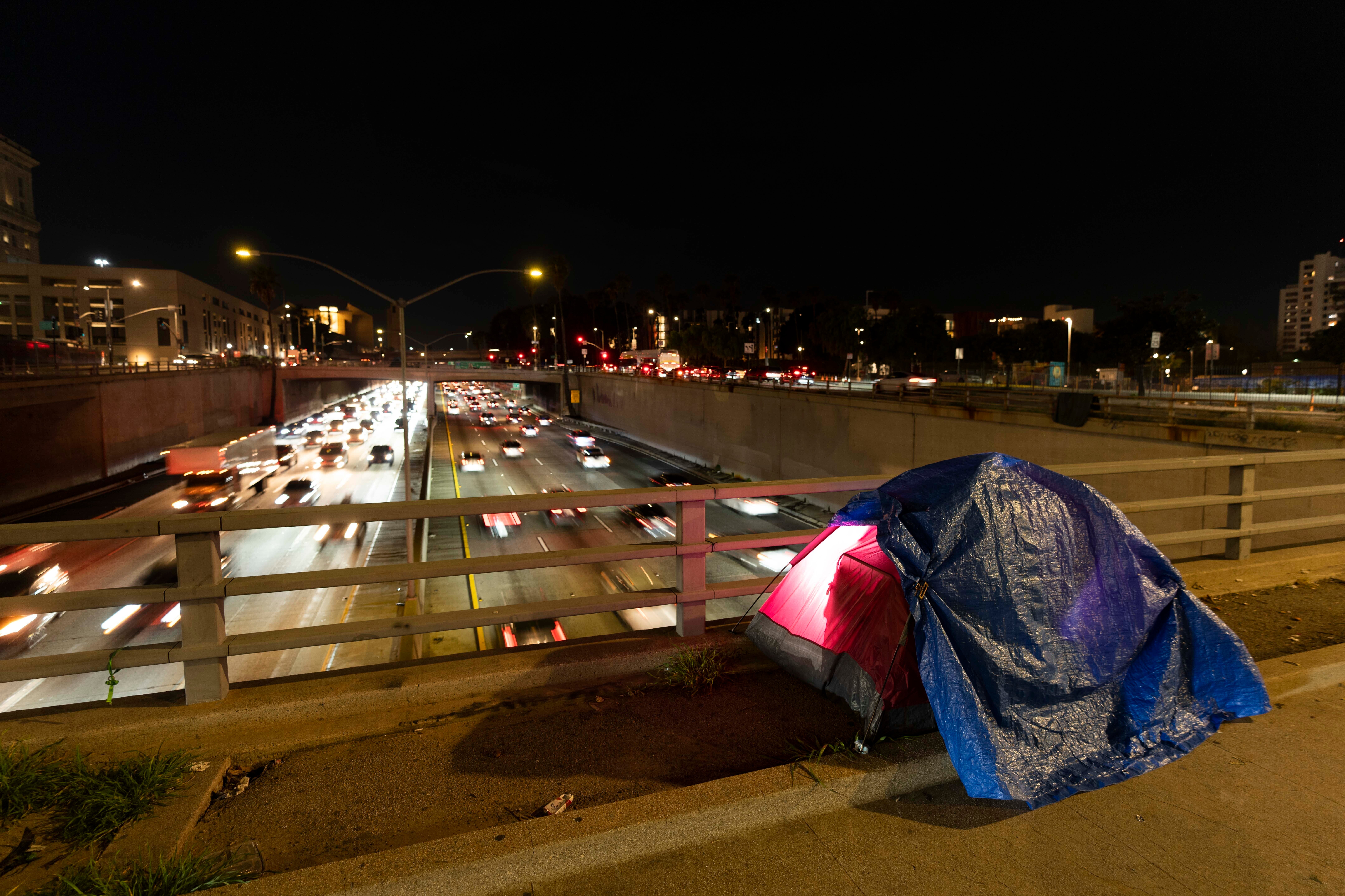 A tent pitched on a California highway overpass. The number of homeless individuals 55 and older is expected to triple by 2030, according to researchers at the University of Pennsylvania