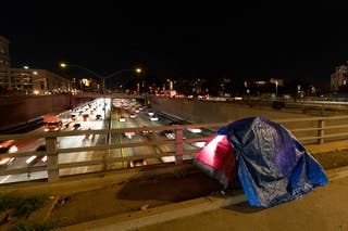A tent pitched on a California highway overpass. The number of homeless individuals 55 and older is expected to triple by 2030, according to researchers at the University of Pennsylvania