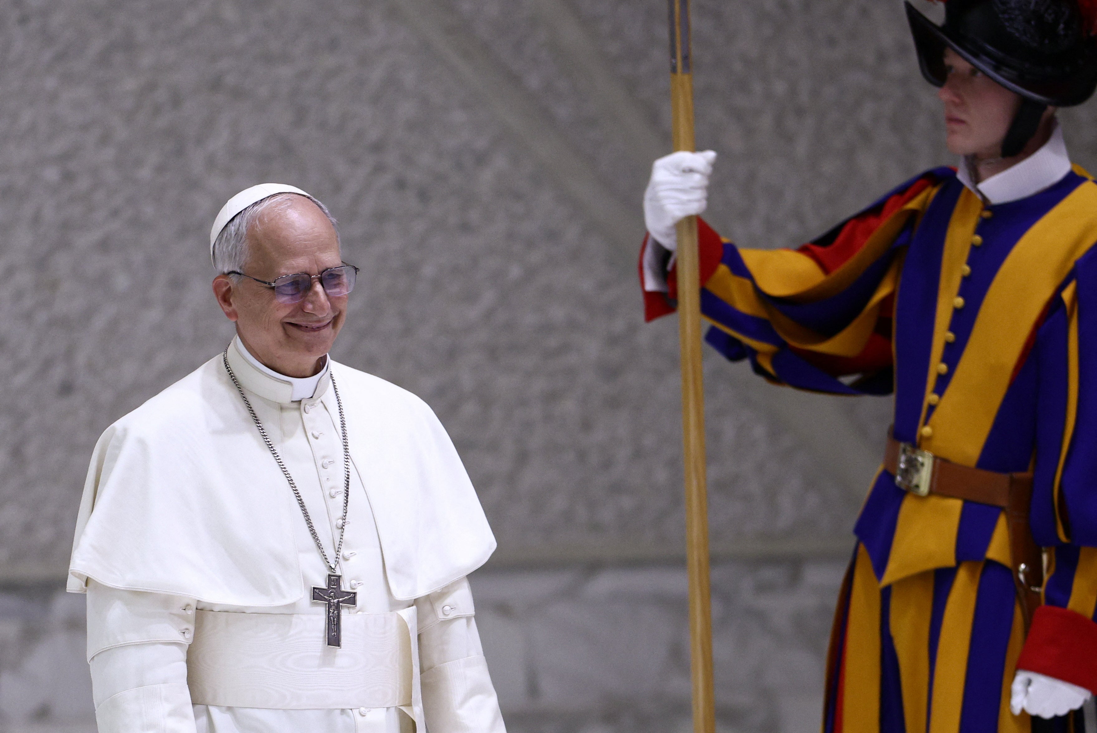 Pope Leo arrives for the press conference