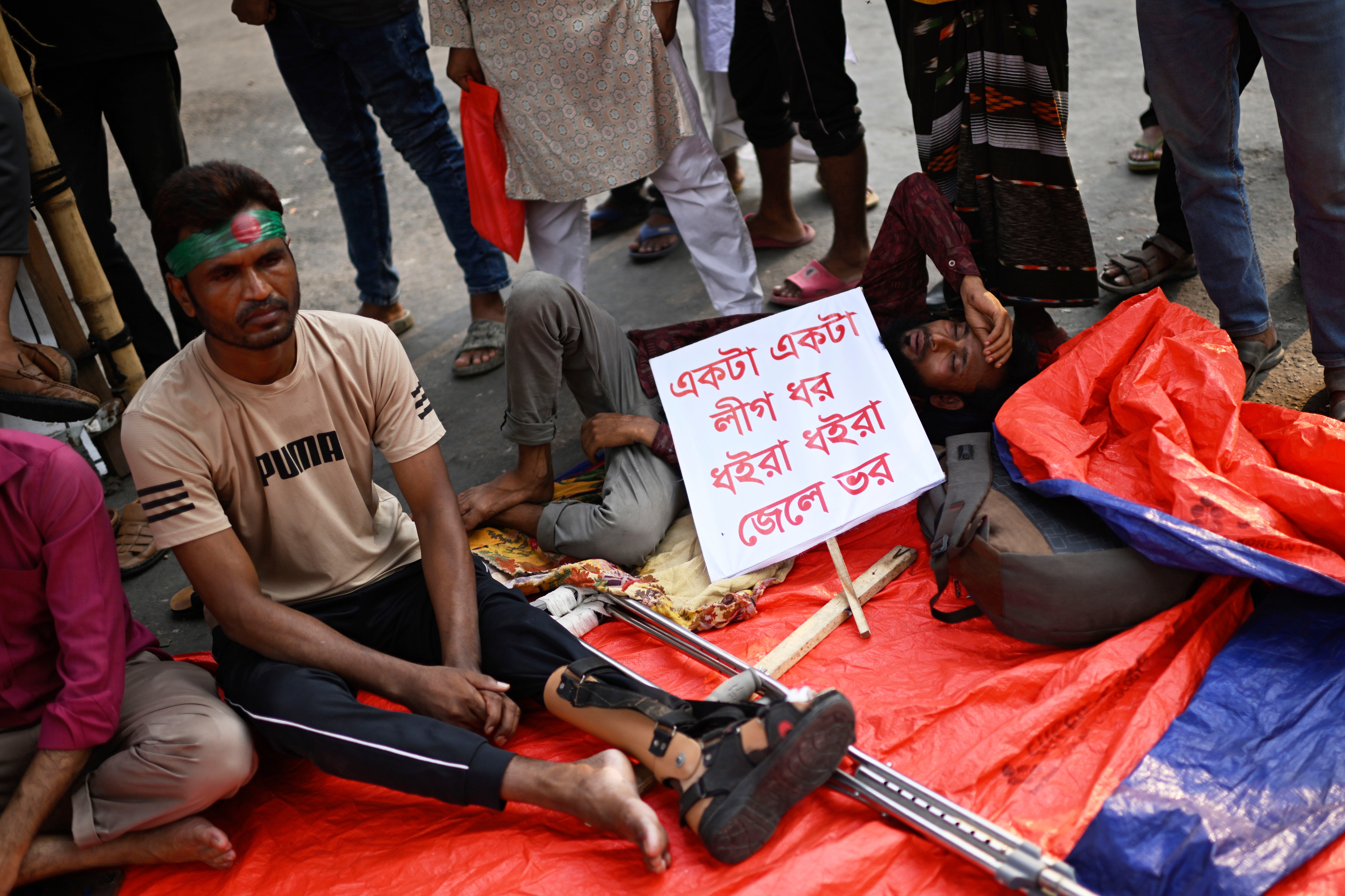 Protesters injured in last year’s protests against Sheikh Hasina during a demonstration in Dhaka, Bangladesh, on 11 May 2025