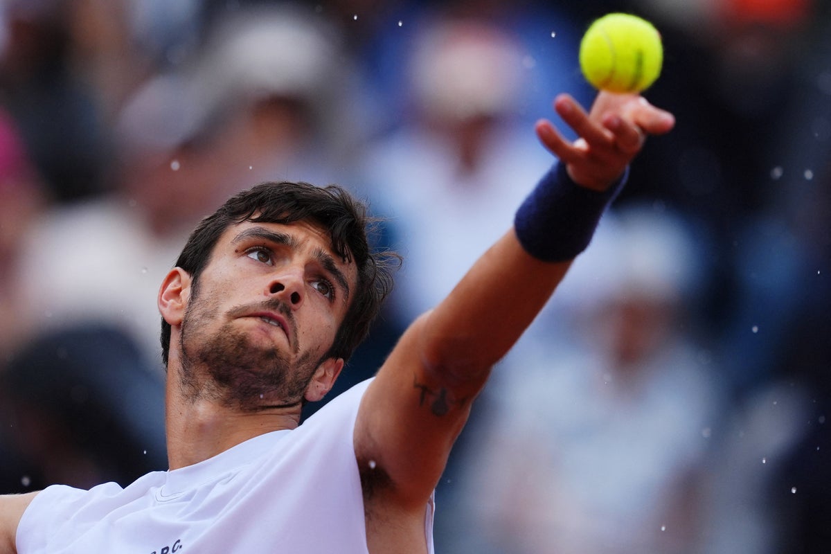 Lorenzo Musetti beats Daniil Medvedev after Rome downpour forces suspension on match point