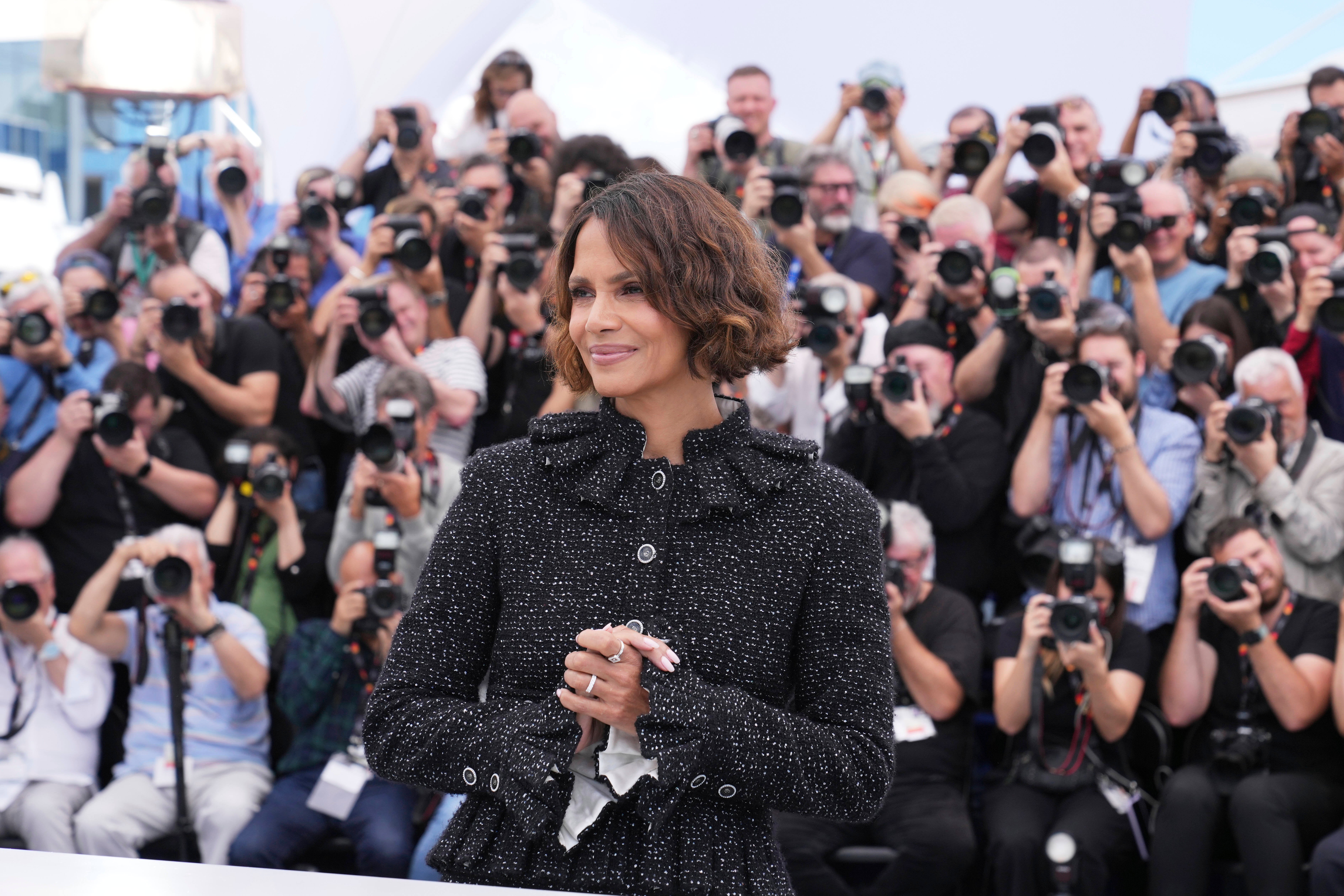 <p>Halle Berry poses for photographers at the jury photo call at the 78th international film festival, Cannes</p>