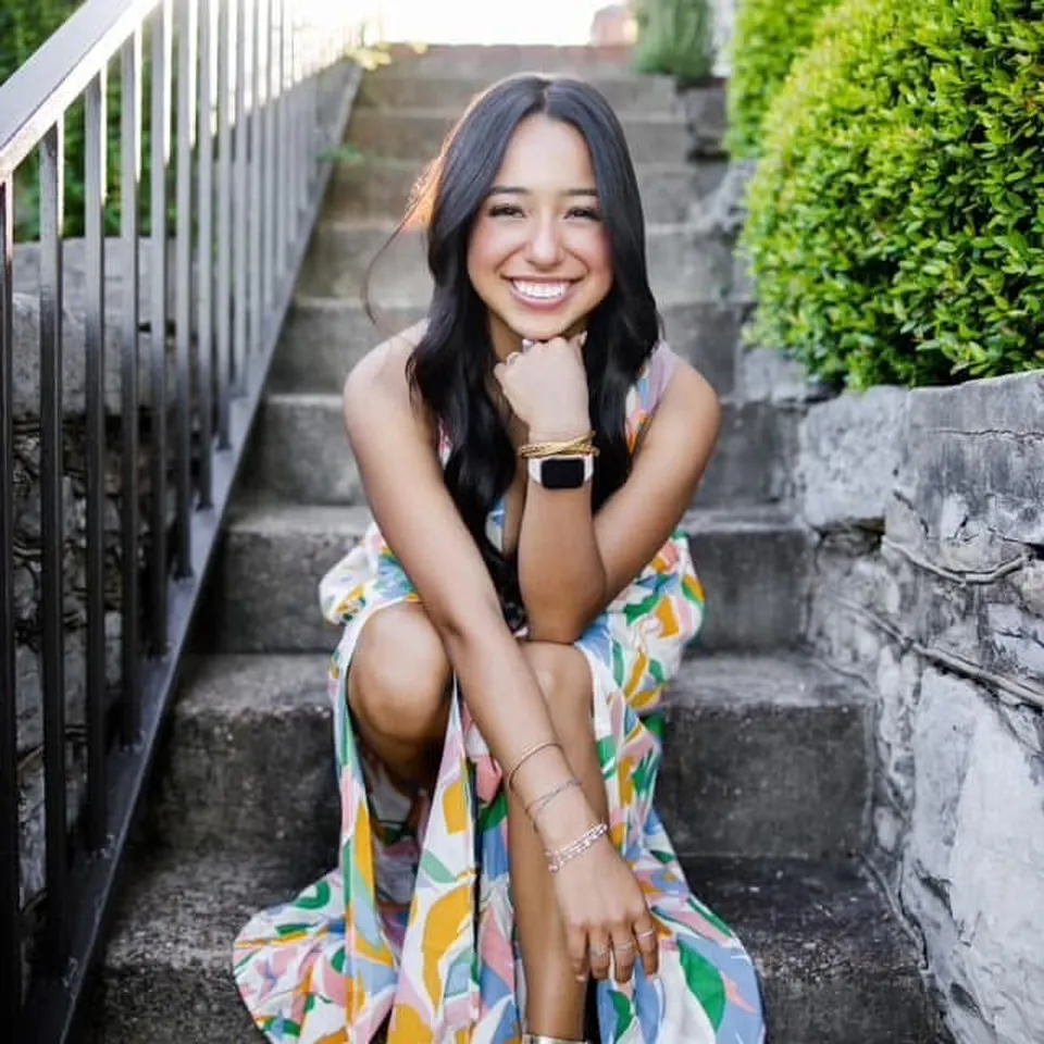 Ximena Arias-Cristobal poses for a senior portrait provided by family friend Hannah Jones. The Georgia college student is facing deportation after she was mistakenly arrested by local police and put into ICE custody