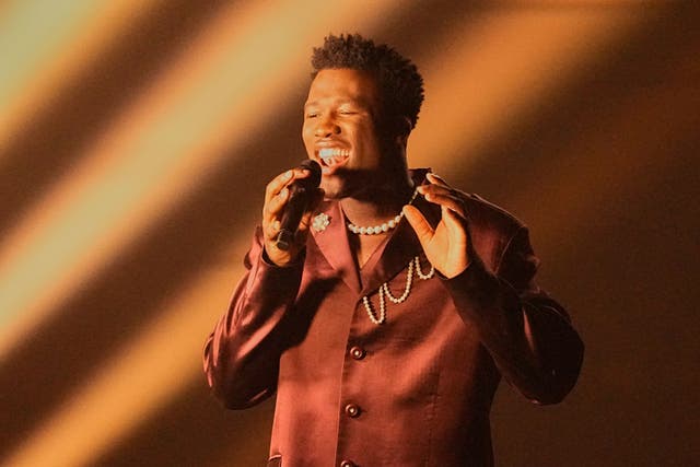 Claude from the Netherlands performing the song C’est La Vie (AP Photo/Martin Meissner)