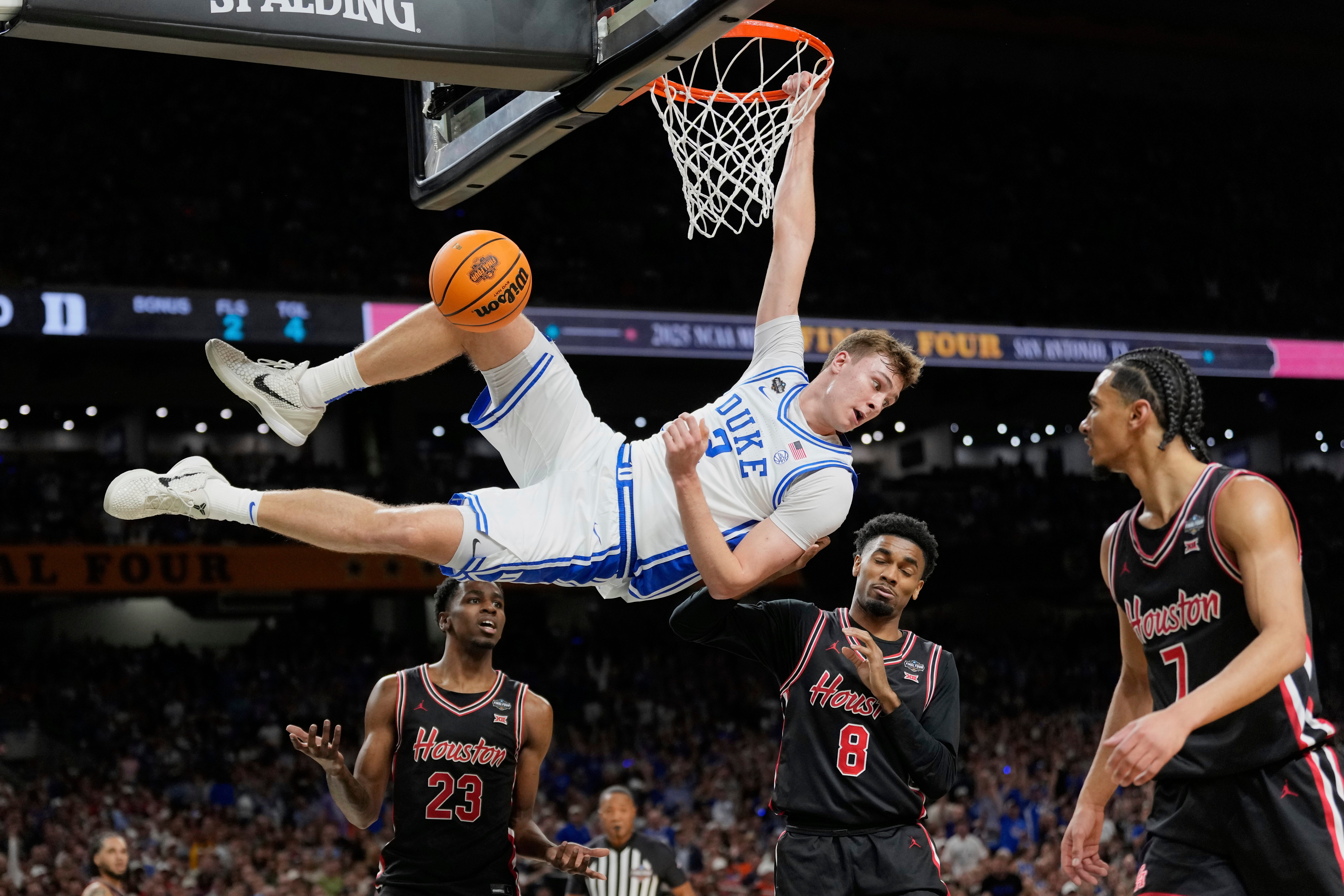 Duke's Cooper Flagg (2) looks back after dunking the ball