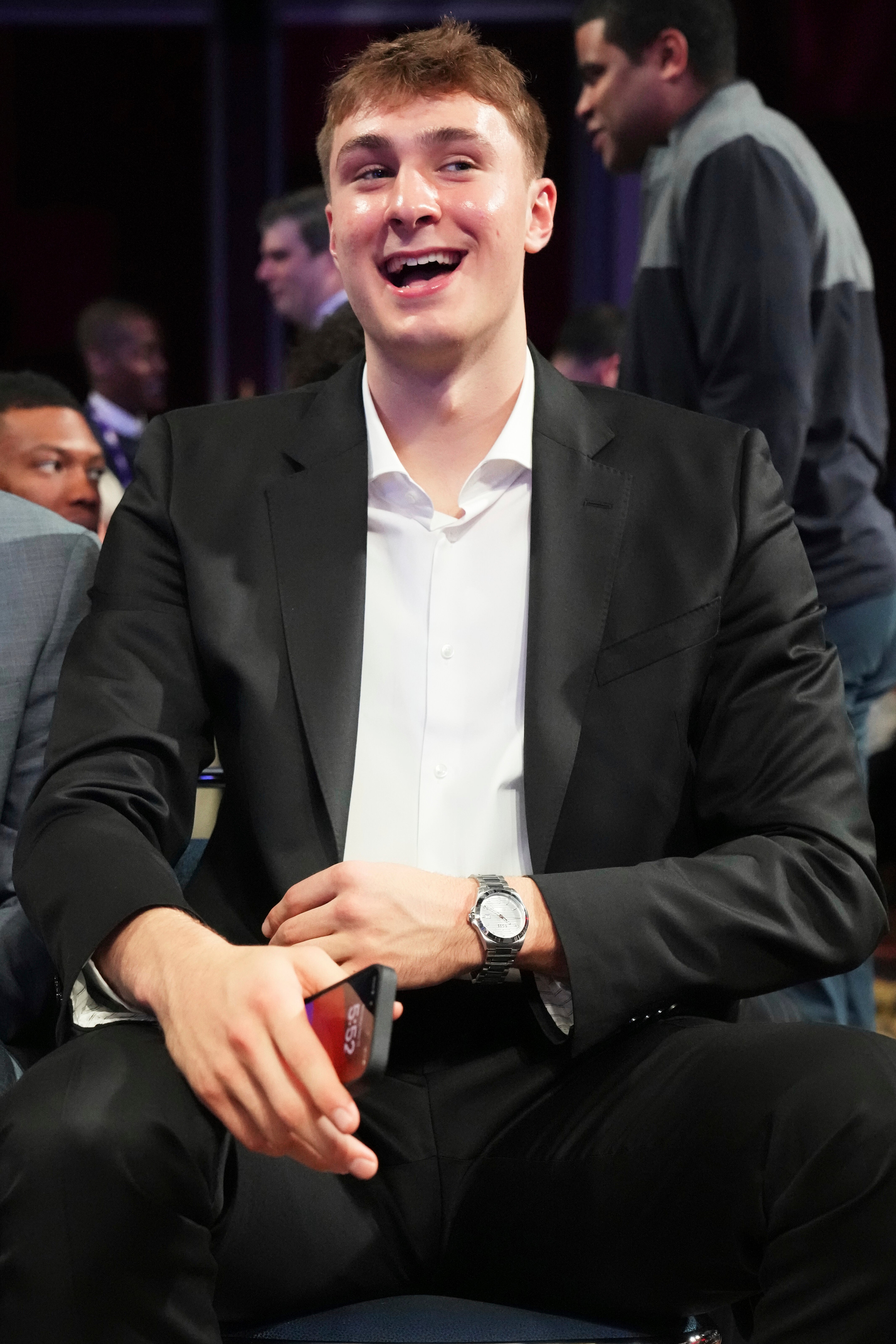 Duke's Cooper Flagg smiles as he waits for the NBA basketball draft lottery in Chicago