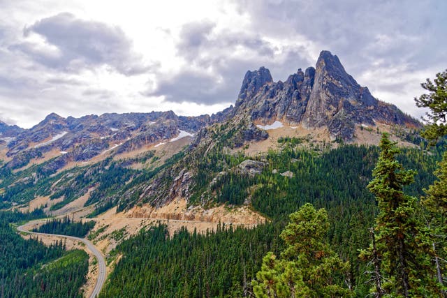 <p>Three men were confirmed dead at the accident site near North Early Winters Spire, in Washington state, while a fourth managed to set himself free </p>