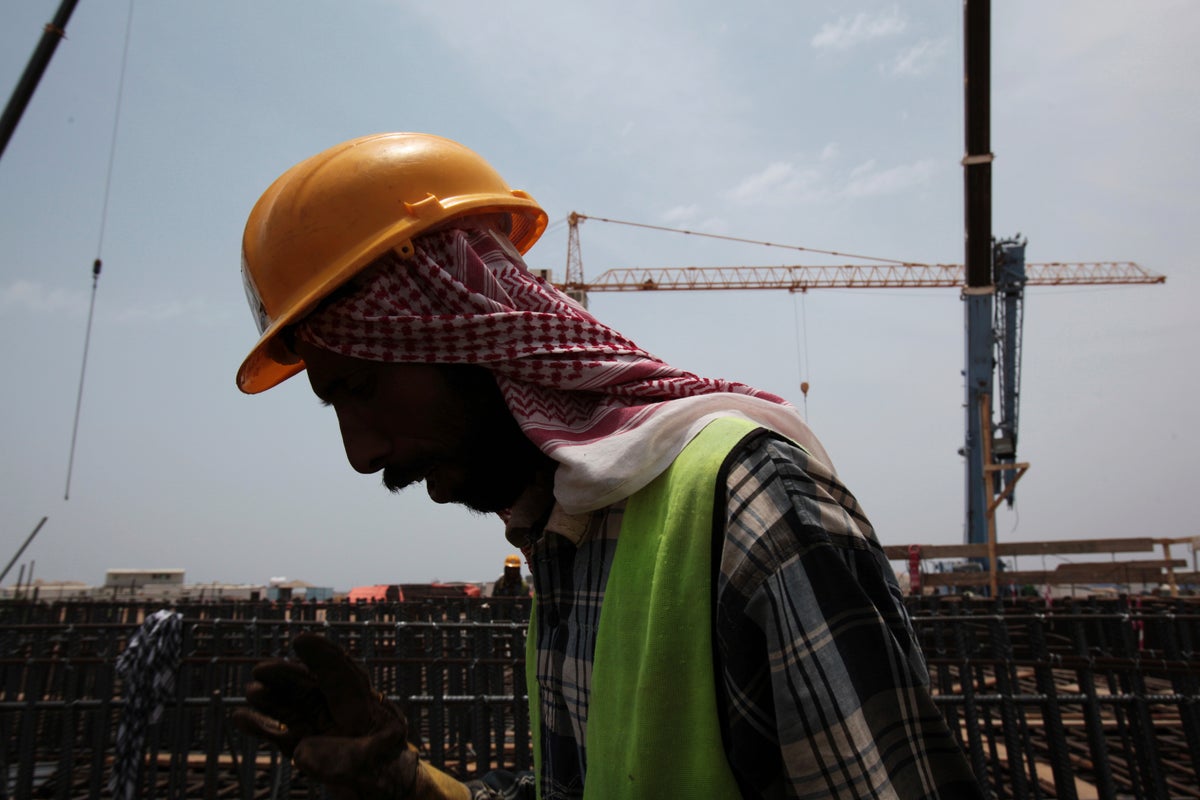 Rights groups say migrant workers are dying on Saudi job sites as kingdom prepares for World Cup