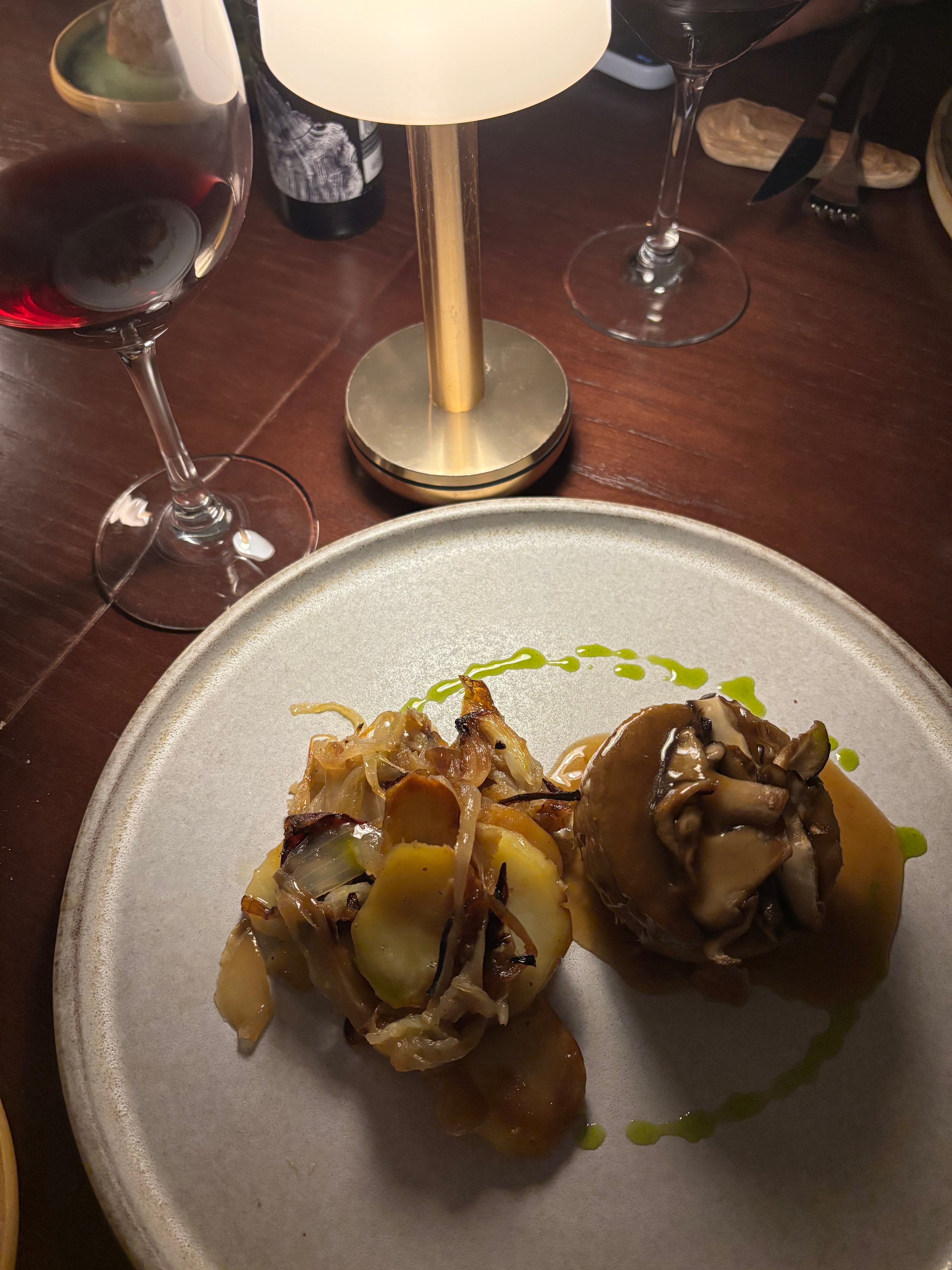Crispy lamb terrine, roasted potatoes and mushrooms prepared by chefs at the Gran Hotel Mas d’en Bruno despite a power cut. (Rebecca Black/PA)