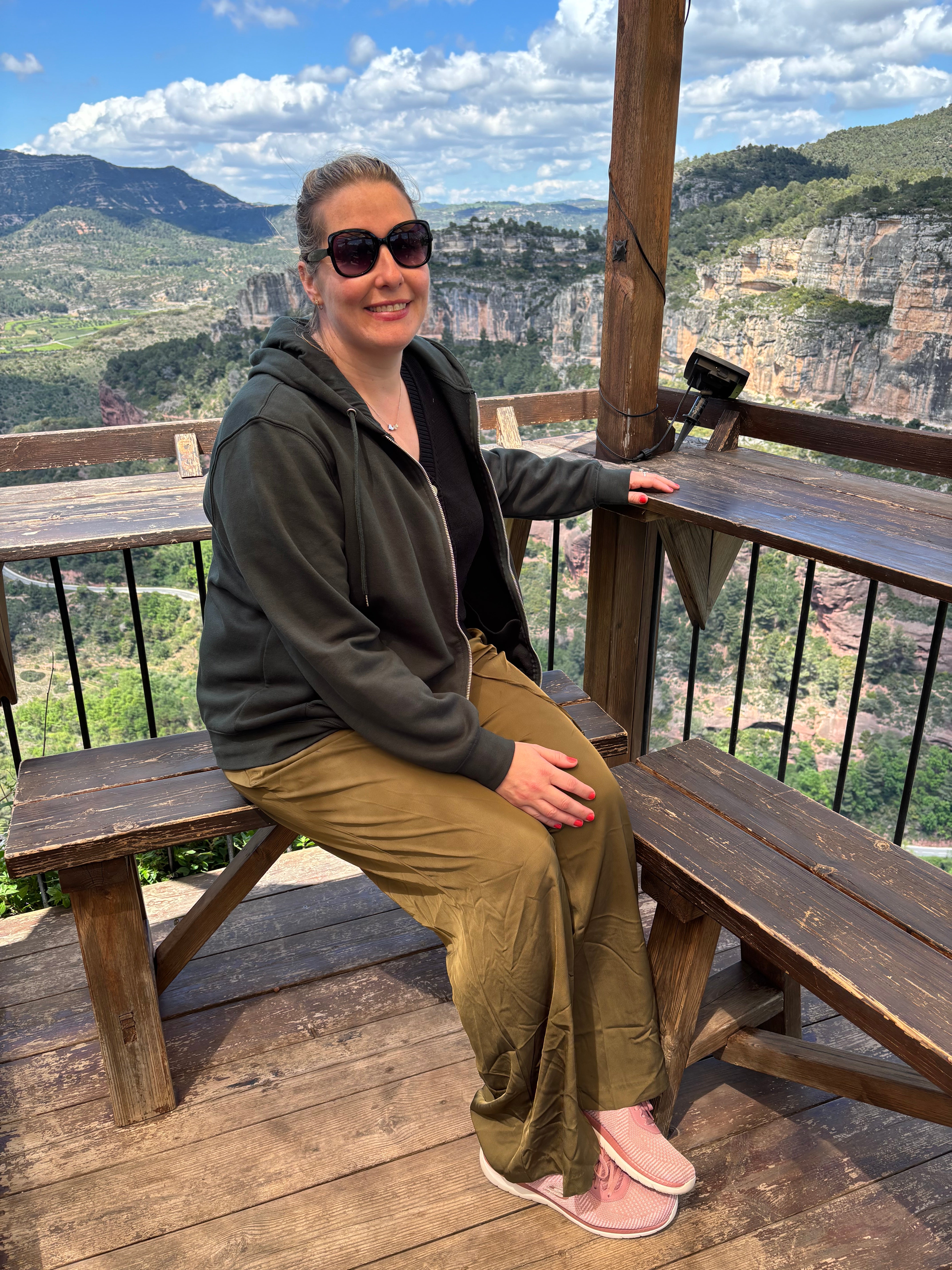 Writer Rebecca Black enjoys the views from the eaterie Refugi in the village of Siurana in Spain. (Rebecca Black/PA)