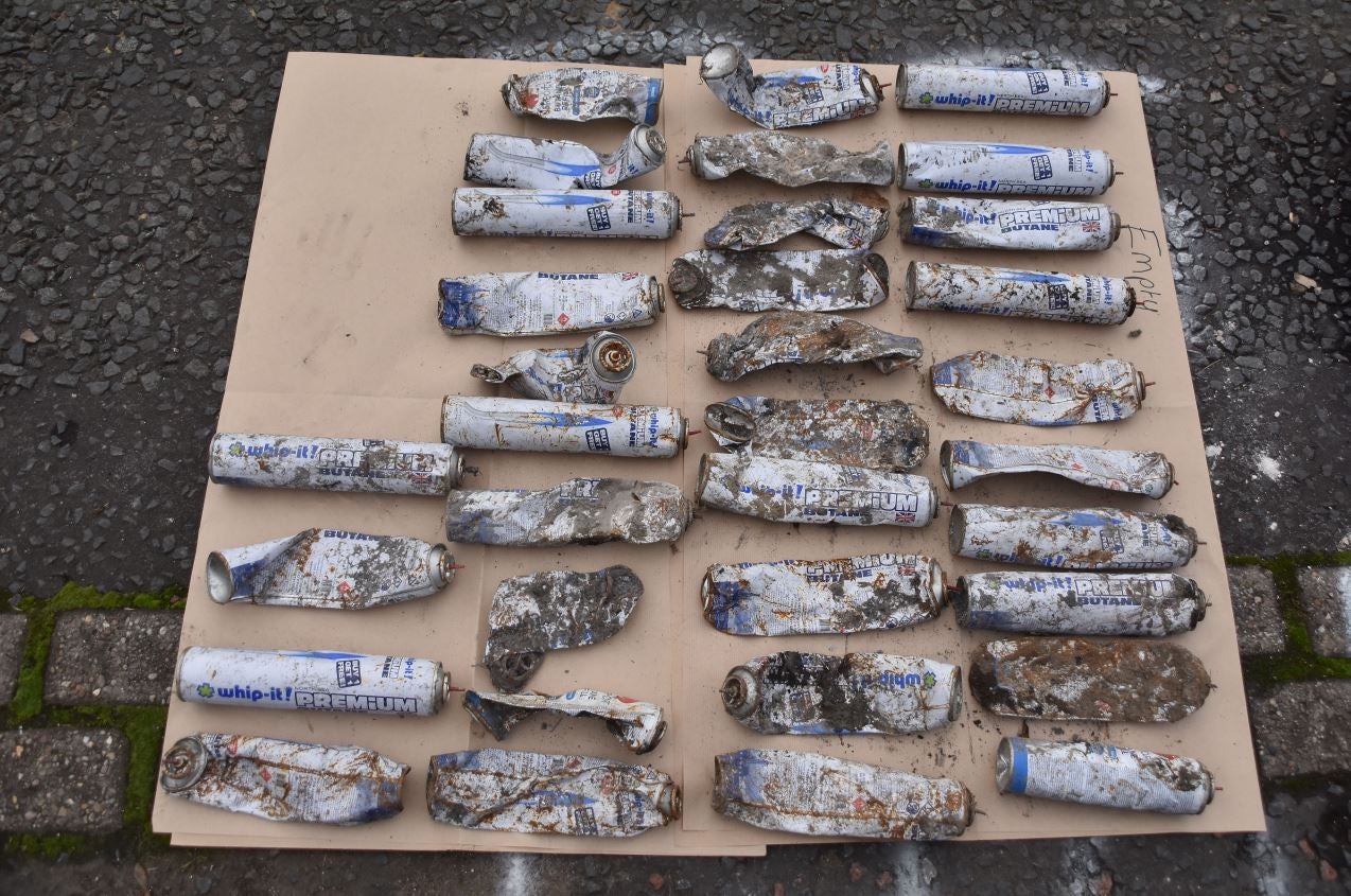 Some of the 100 gas canisters used to make cannabis gummy sweets, which led to an explosion which killed two people