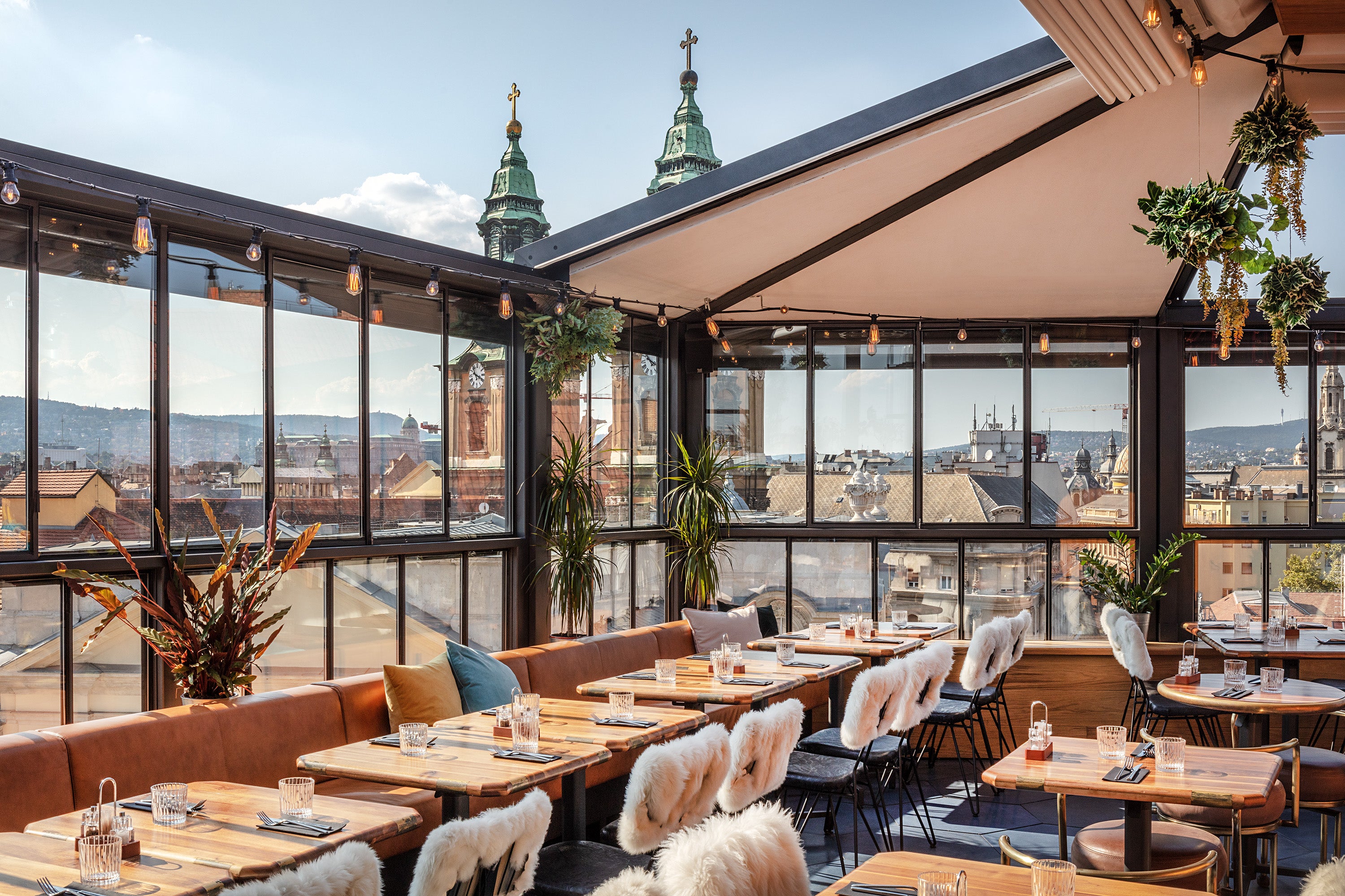 Sip your morning coffee on Hotel Rum’s rooftop with spectacular views