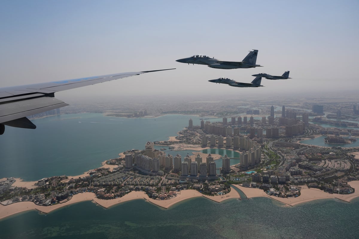 Trump's Qatar trip is off to a flying start as Air Force One gets another fighter jet escort