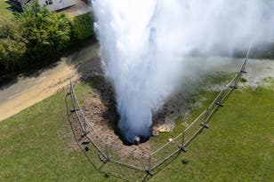 Watch huge jet of water spray across homes as burst main flood streets
