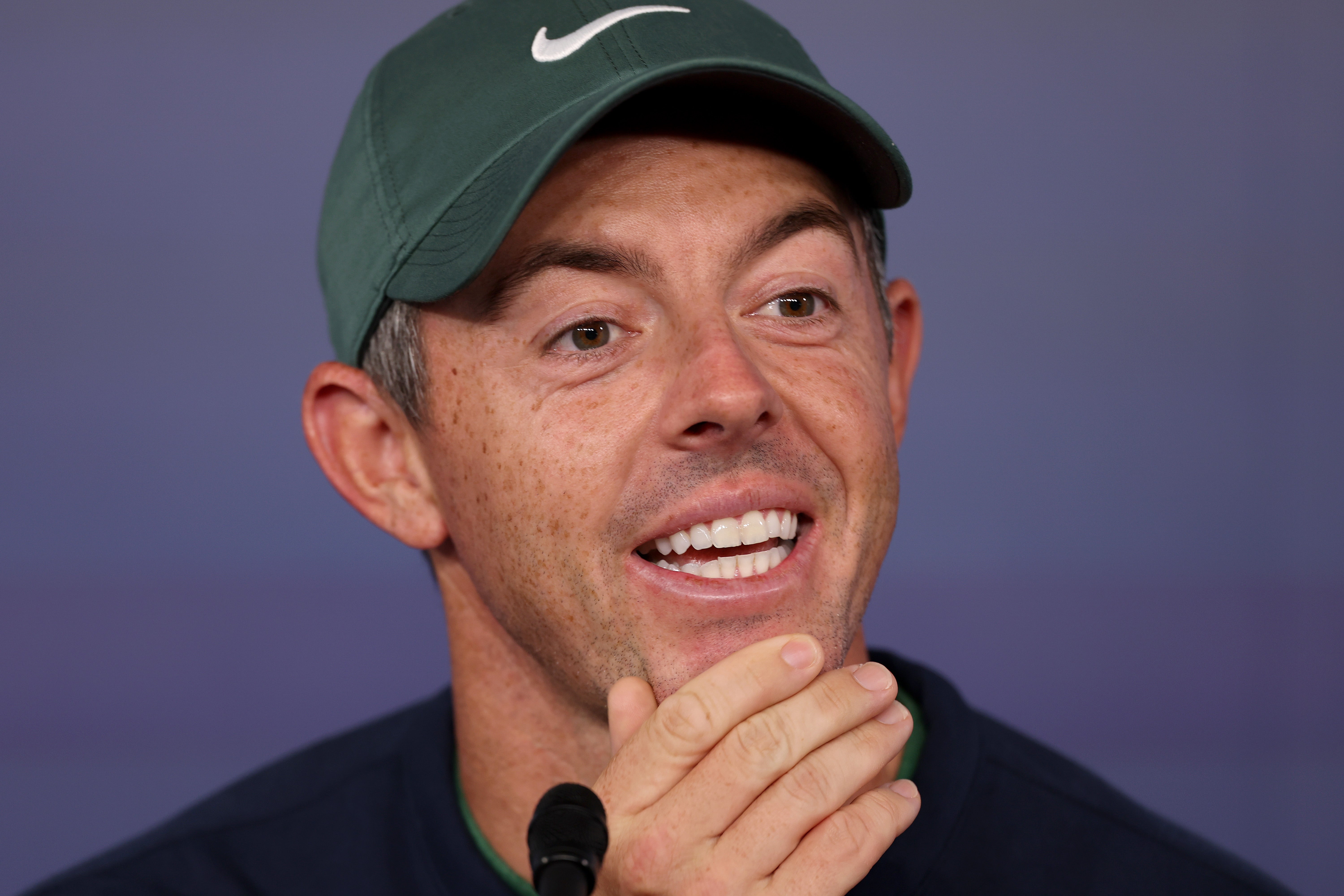 Rory McIlroy of Northern Ireland talks with reporters during a press conference prior to the PGA Championship at Quail Hollow