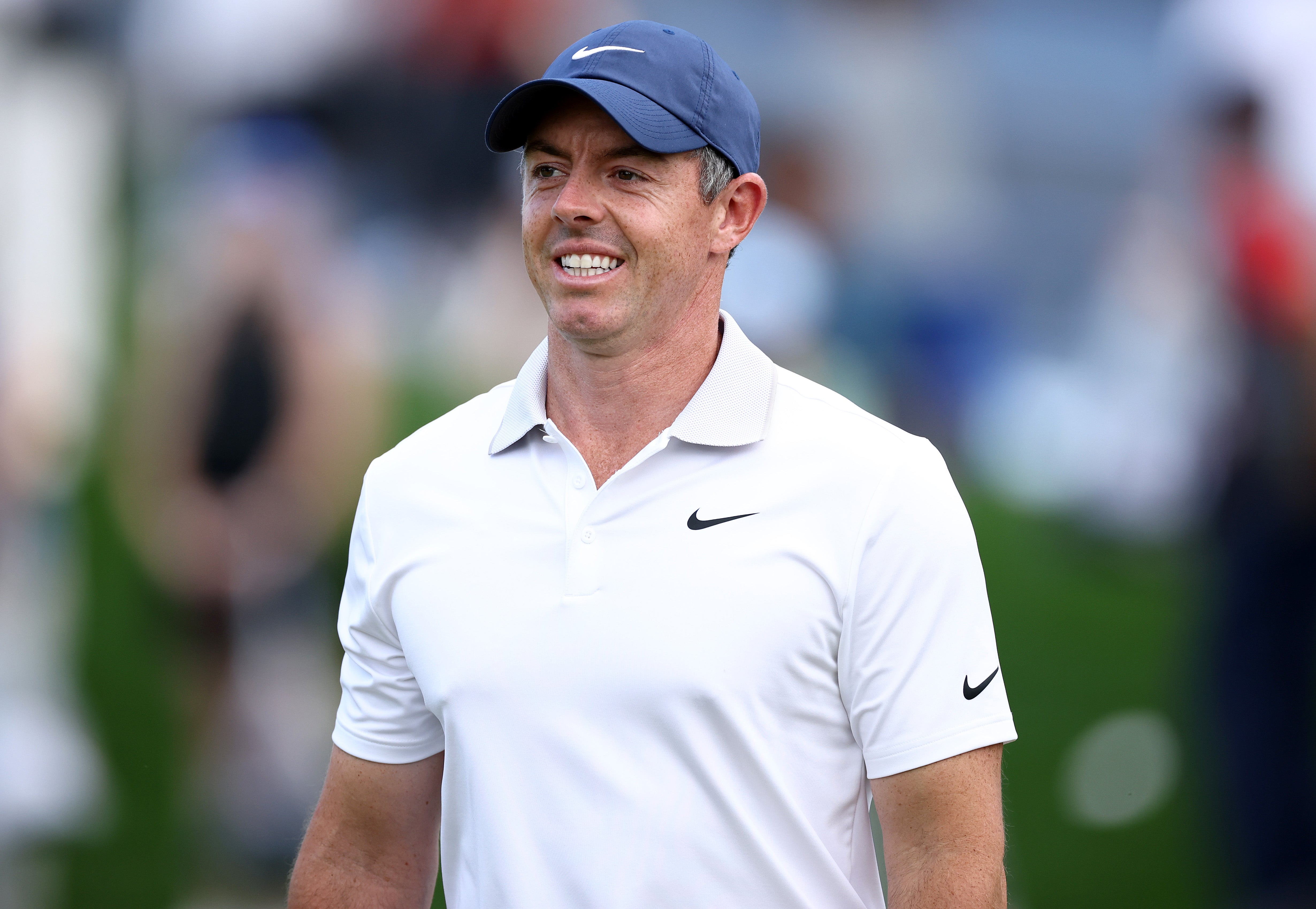 Rory McIlroy of Northern Ireland walks on the first green prior to the PGA Championship at Quail Hollow