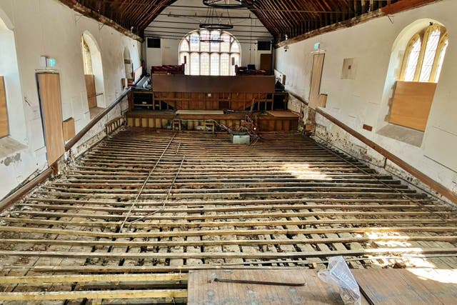 An area of historic timber floor larger than the size of a tennis court has been exposed at St George’s Guildhall in King’s Lynn, Norfolk as part of a heritage project (St George’s Guildhall/ PA)
