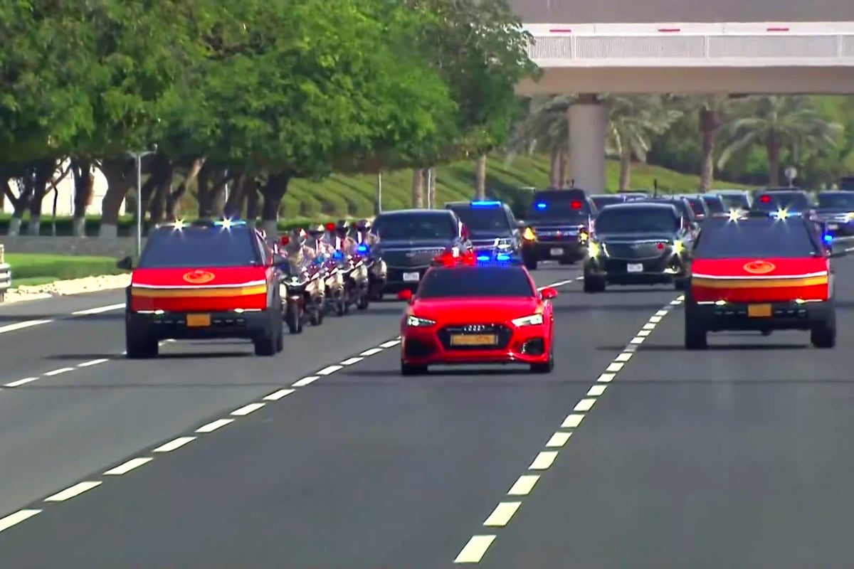 Watch: Trump welcomed by parade of red Cybertrucks and camels during Qatar visit