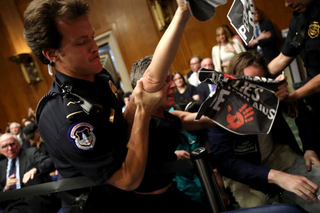 <p>U.S. Capitol Police arrest protesters as they disrupt budget testimony by  Secretary of Health and Human Services Robert F. Kennedy Jr in a  Senate committee hearing</p>