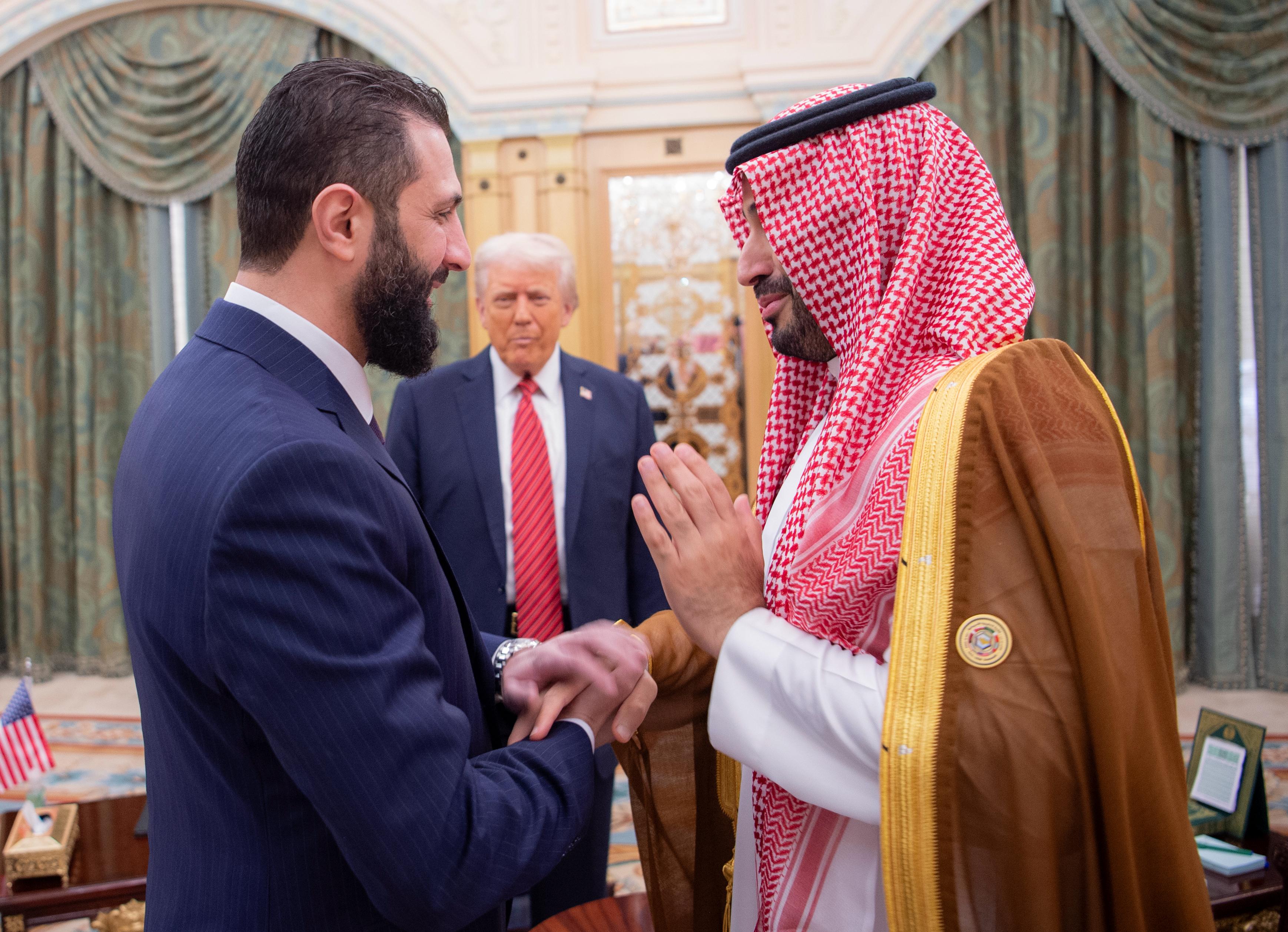 Donald Trump meets Syria’s President Ahmed al-Sharaa, left