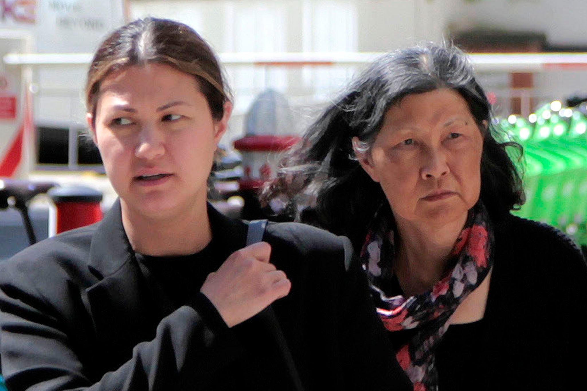 Fong (R) and Natalie (L) Cockell outside London's High Court during inheritance fight