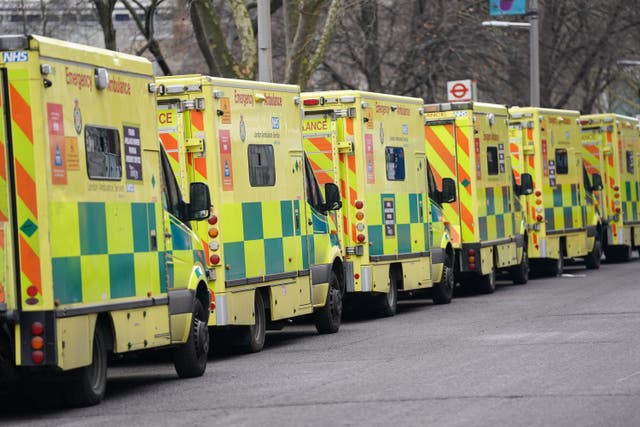 Ambulances parked outside A&E units waiting to hand over patients are a common sight at the UK’s hospitals (Kirsty O’Connor/PA)