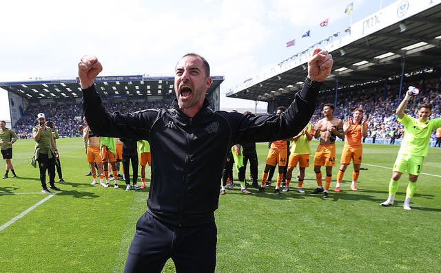 <p>Ruben Selles celebrates after Hull drew at Portsmouth to avoid relegation</p>