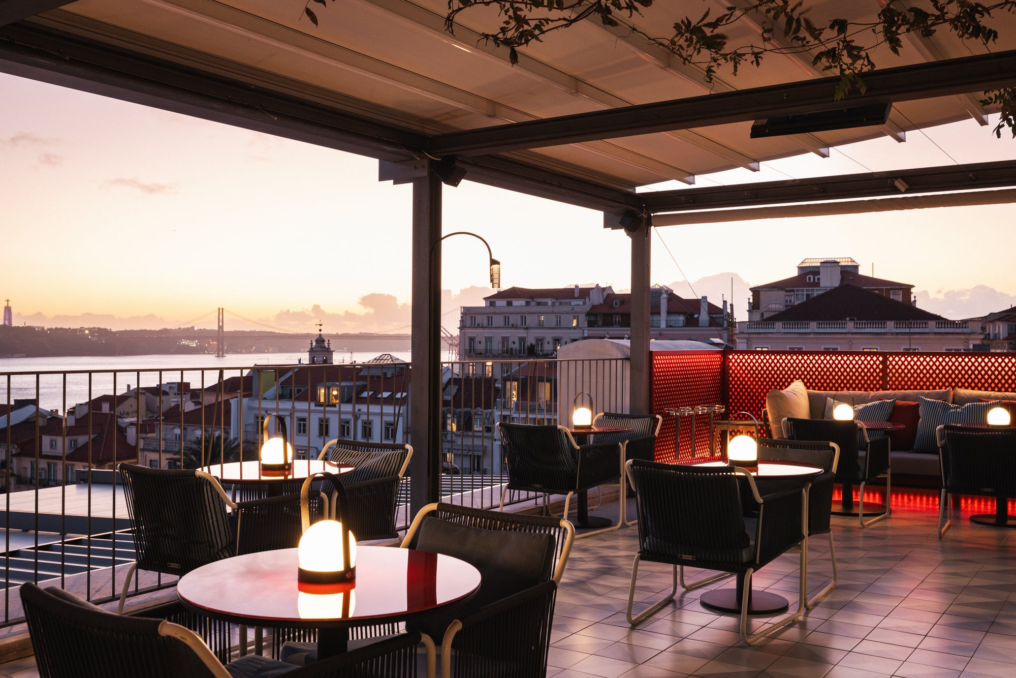The rooftop bar at Bairro Alto Hotel is one of the most sought-after sunset spots in the city