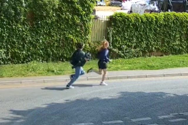 <p>A screen grab taken from CCTV issued by the Metropolitan Police of two teenagers they want to speak to after two kittens were tortured and killed in Ruislip, London</p>