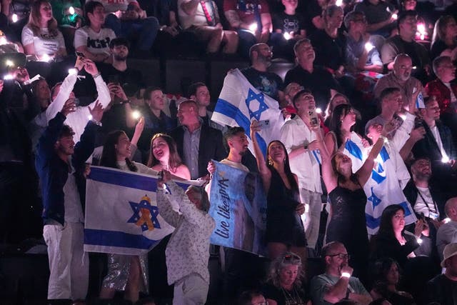 <p>Israeli fans cheer for Yuval Raphael from Israel. (AP Photo/Martin Meissner)</p>