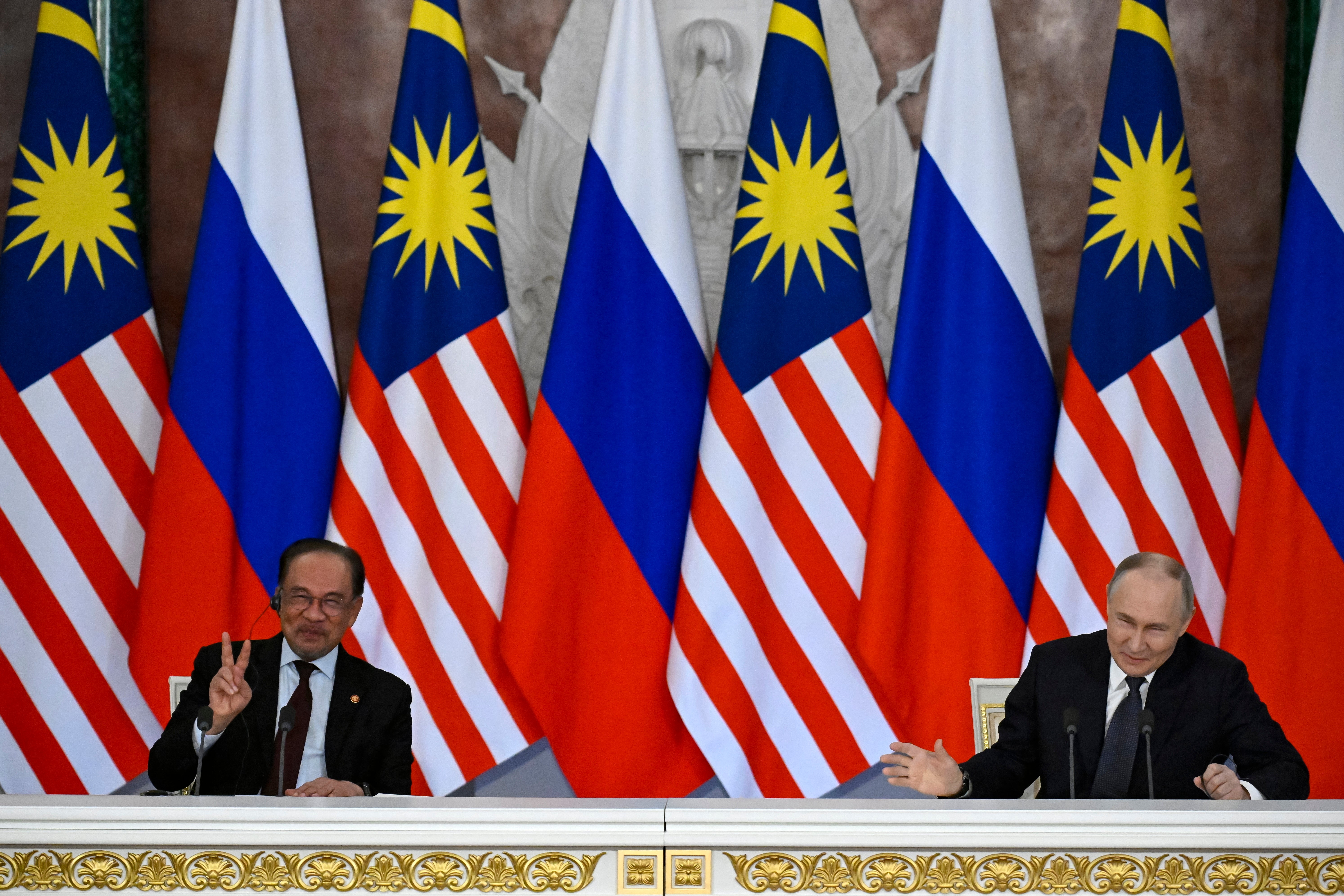 Putin and Anwar meet as UN releases report on MH17 downing by Russian missile