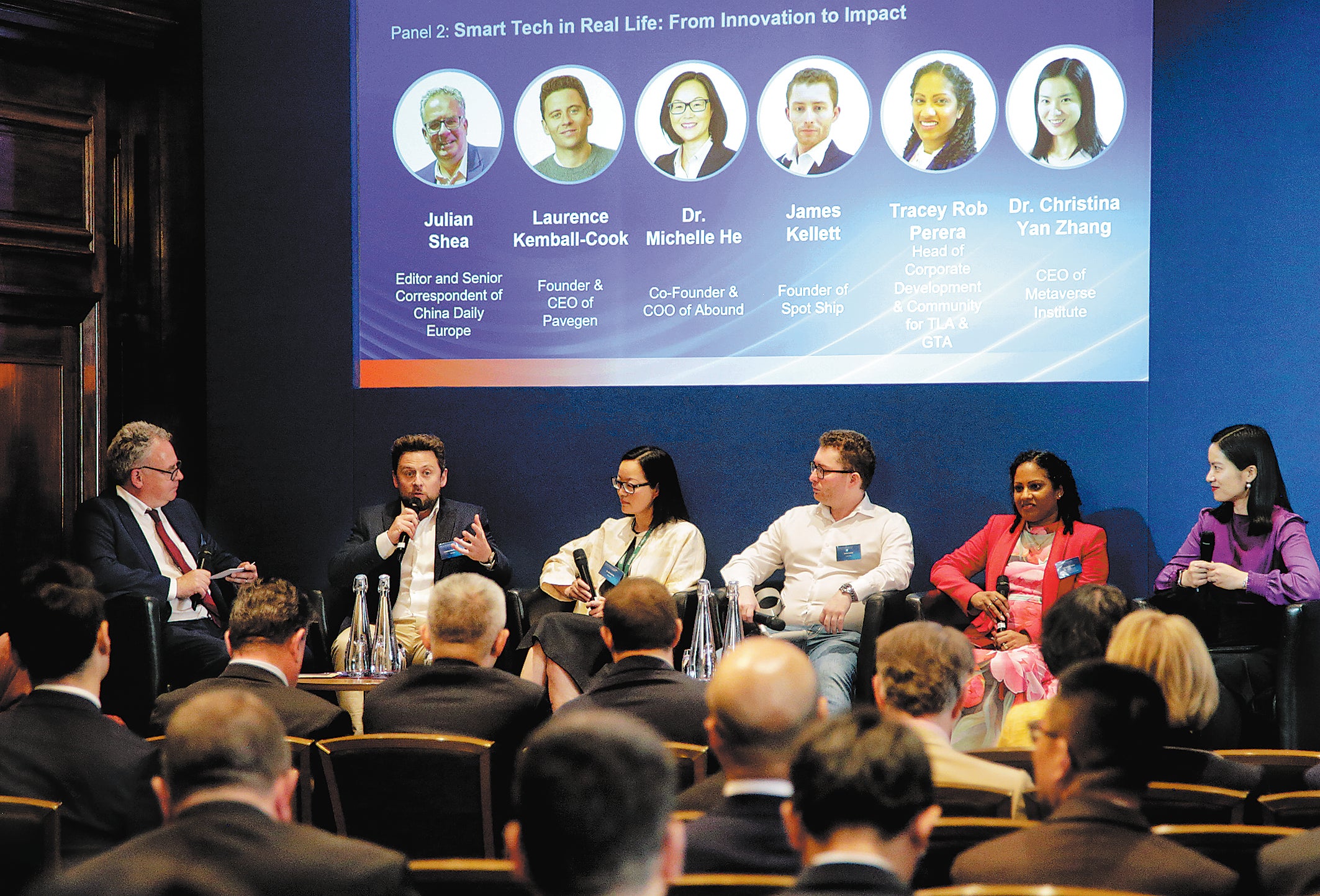 Participants share their insights during the forum