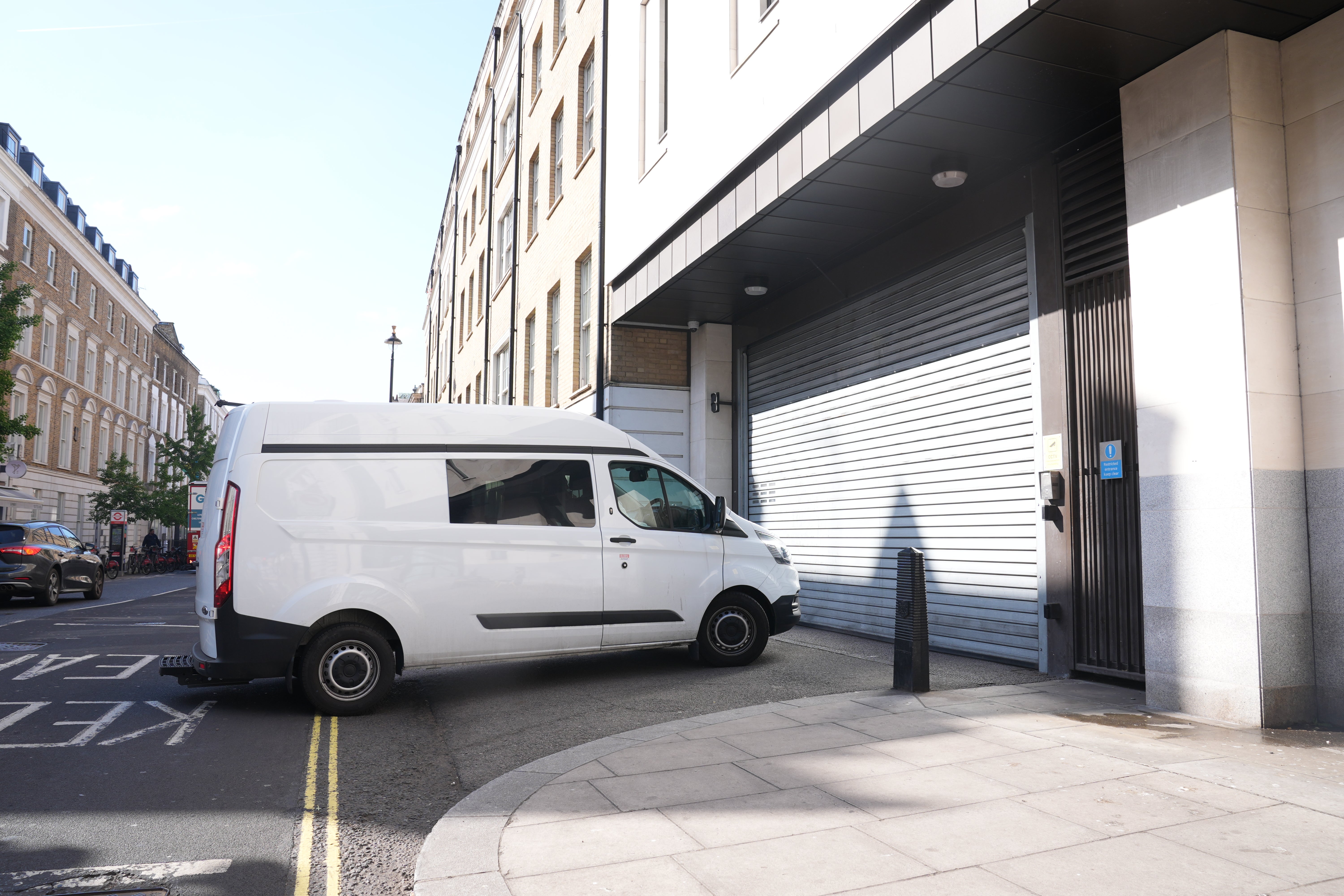 A van with a police escort seen arriving at Westminster Magistrates' Court in London where Roman Lavrynovych appeared