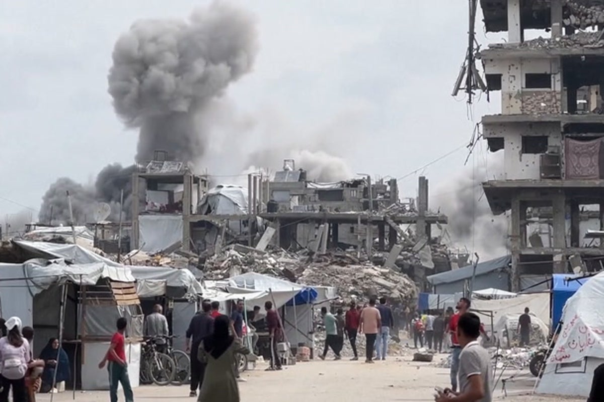 Moment Gaza residents flee as Israeli airstrike hits house caught on video