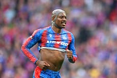 Why is Jean-Philippe Mateta wearing a protective helmet in the FA Cup final?