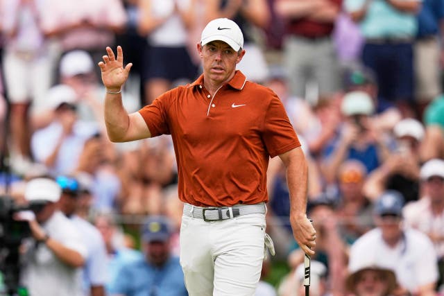 <p>Rory McIlroy acknowledges the crowd after making a birdie on the second hole during round two</p>