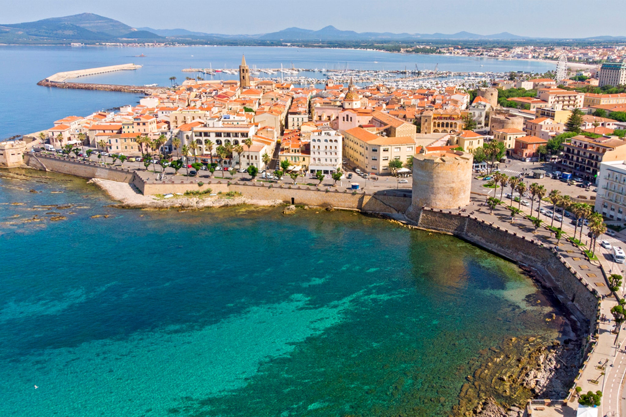 Less than two hours from the airport, Alghero has a natural beauty and history to match