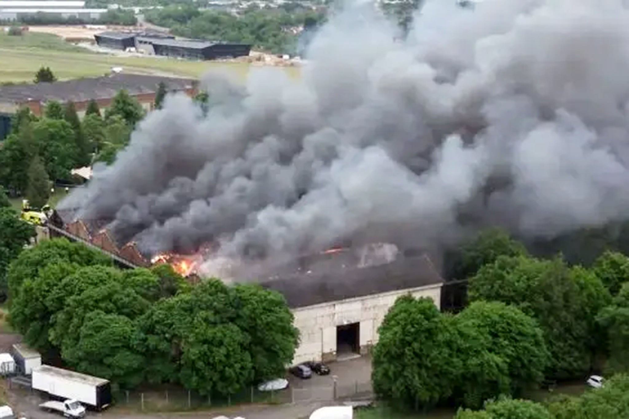 Neighbours heard multiple explosions and clouds of dense black smoke spread for miles.
