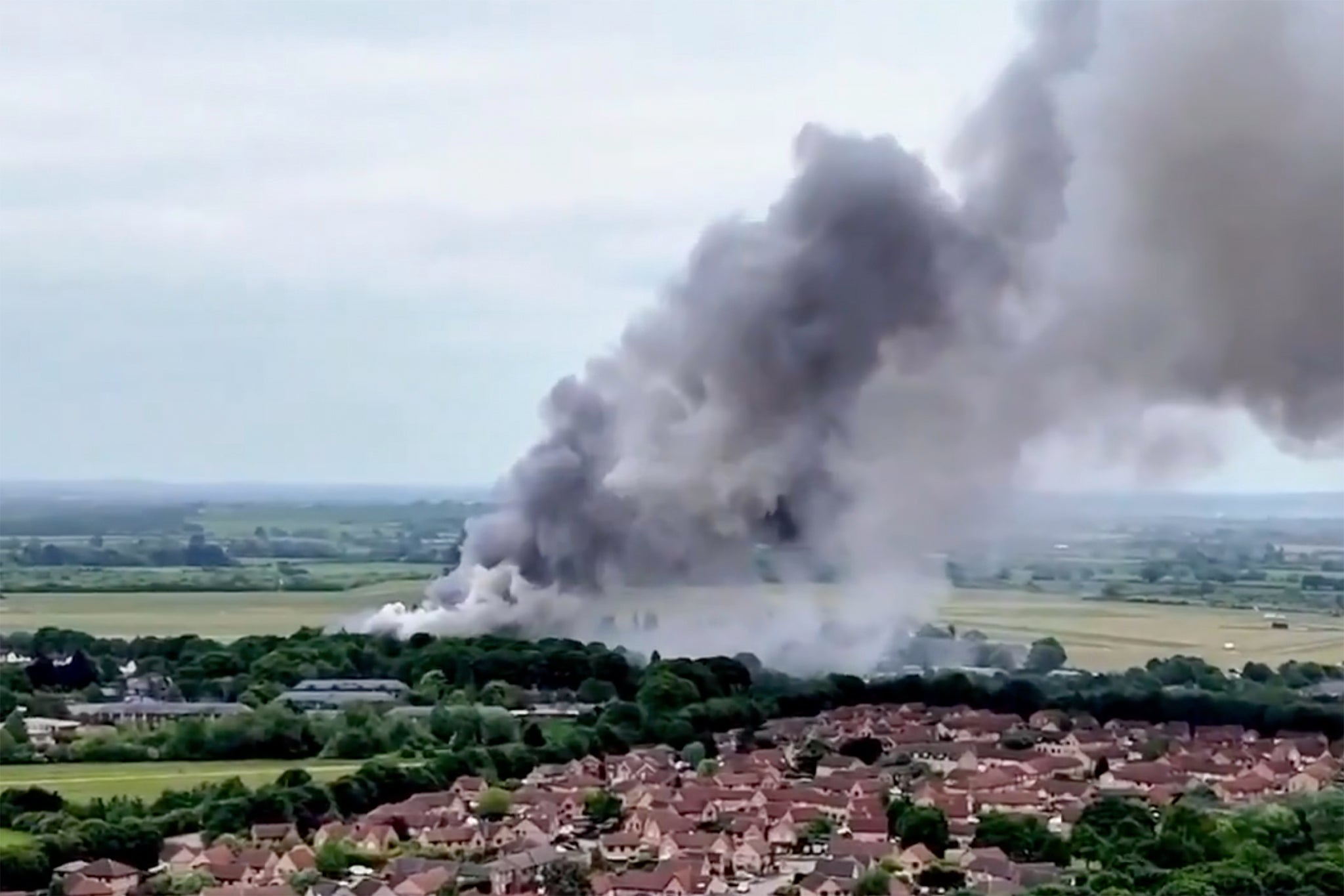Thick smoke could be seen billowing across the sky for miles